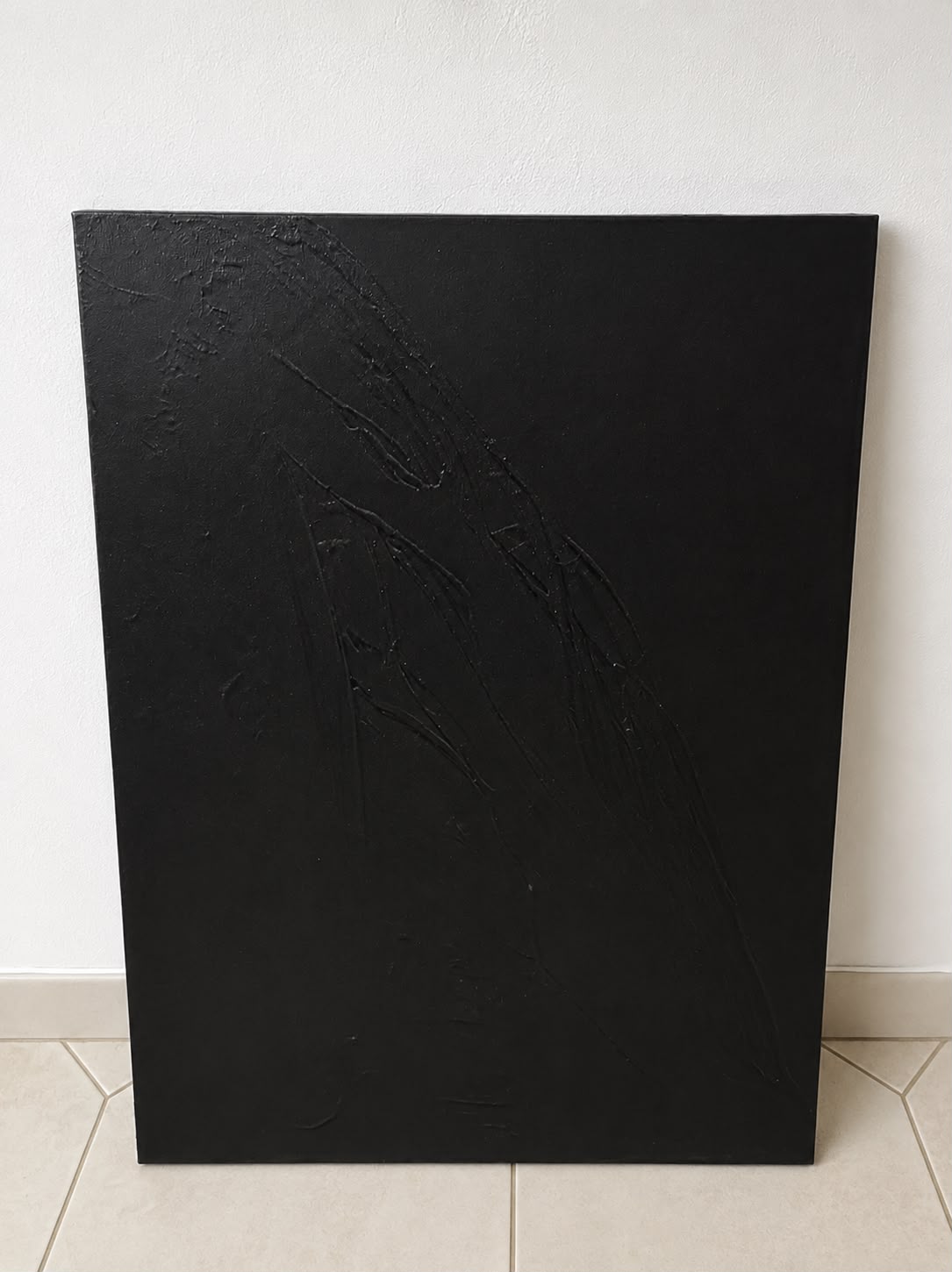 Tableau abstrait noir en relief